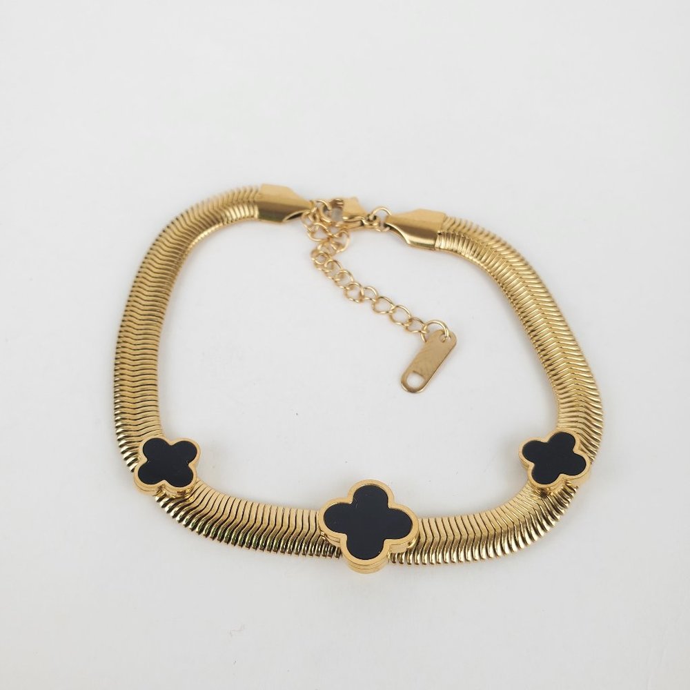 Bracelet new with tags , stainless steel , color gold & black